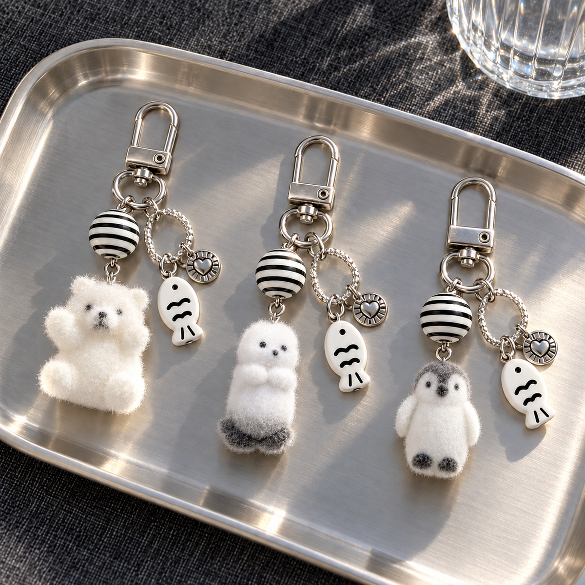 Three animal charm keychains