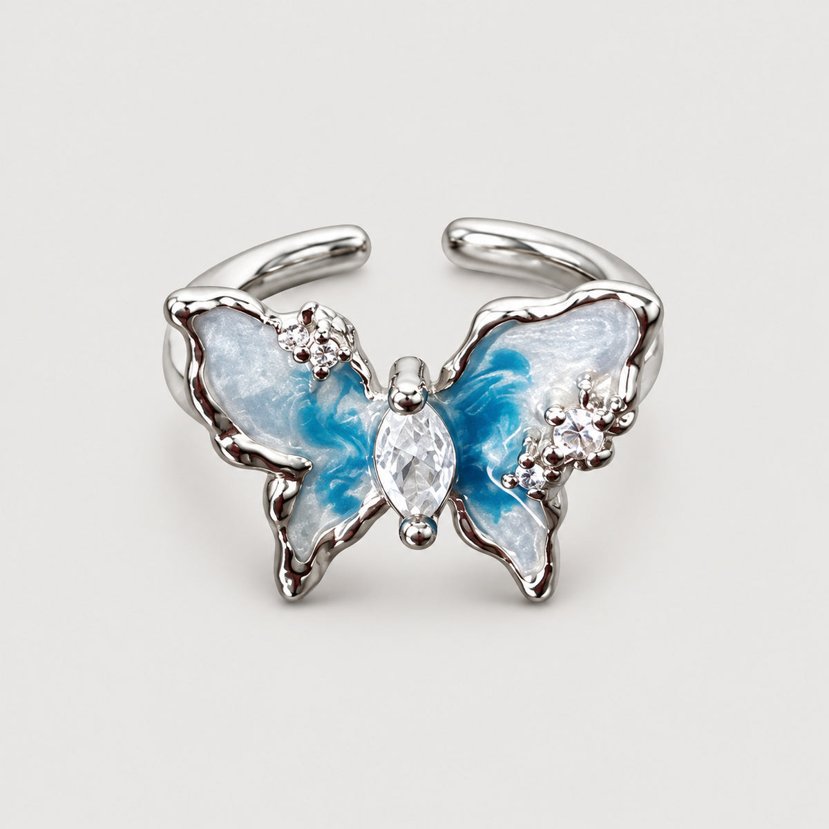 Blue butterfly ring with clear centre stone