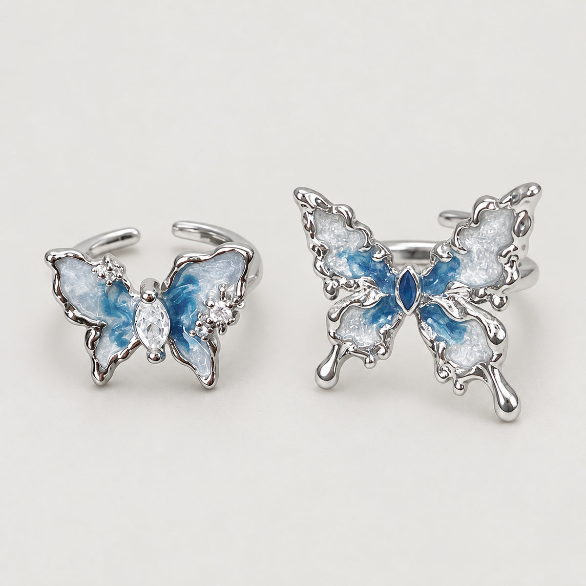 Two blue butterfly ring styles, sold individually