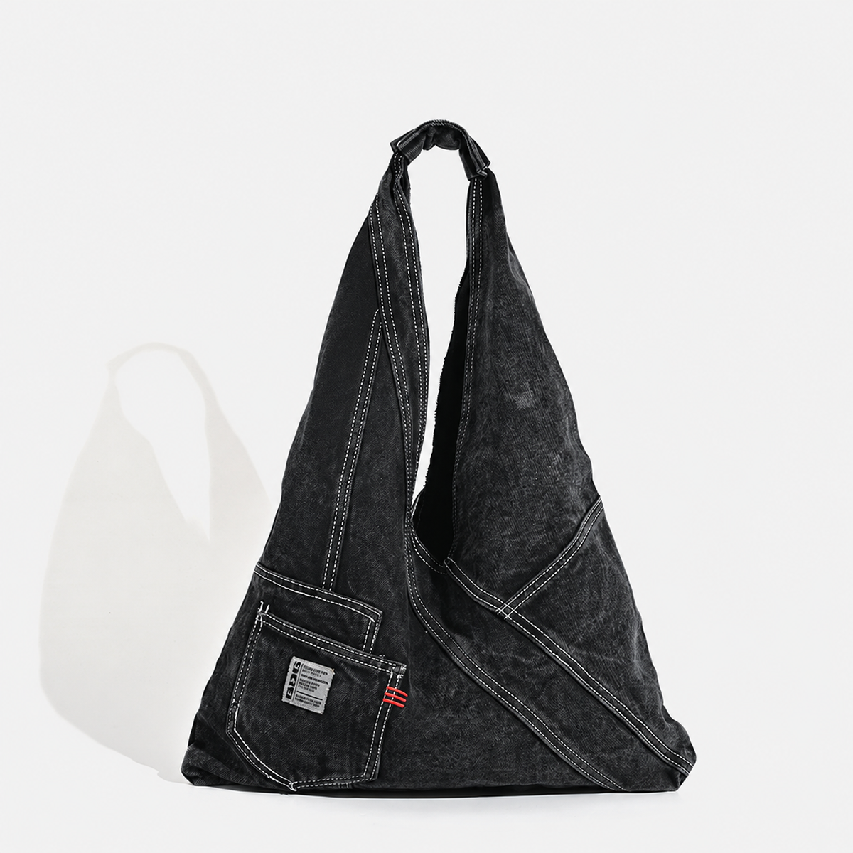 Denim triangle shoulder bag — black front