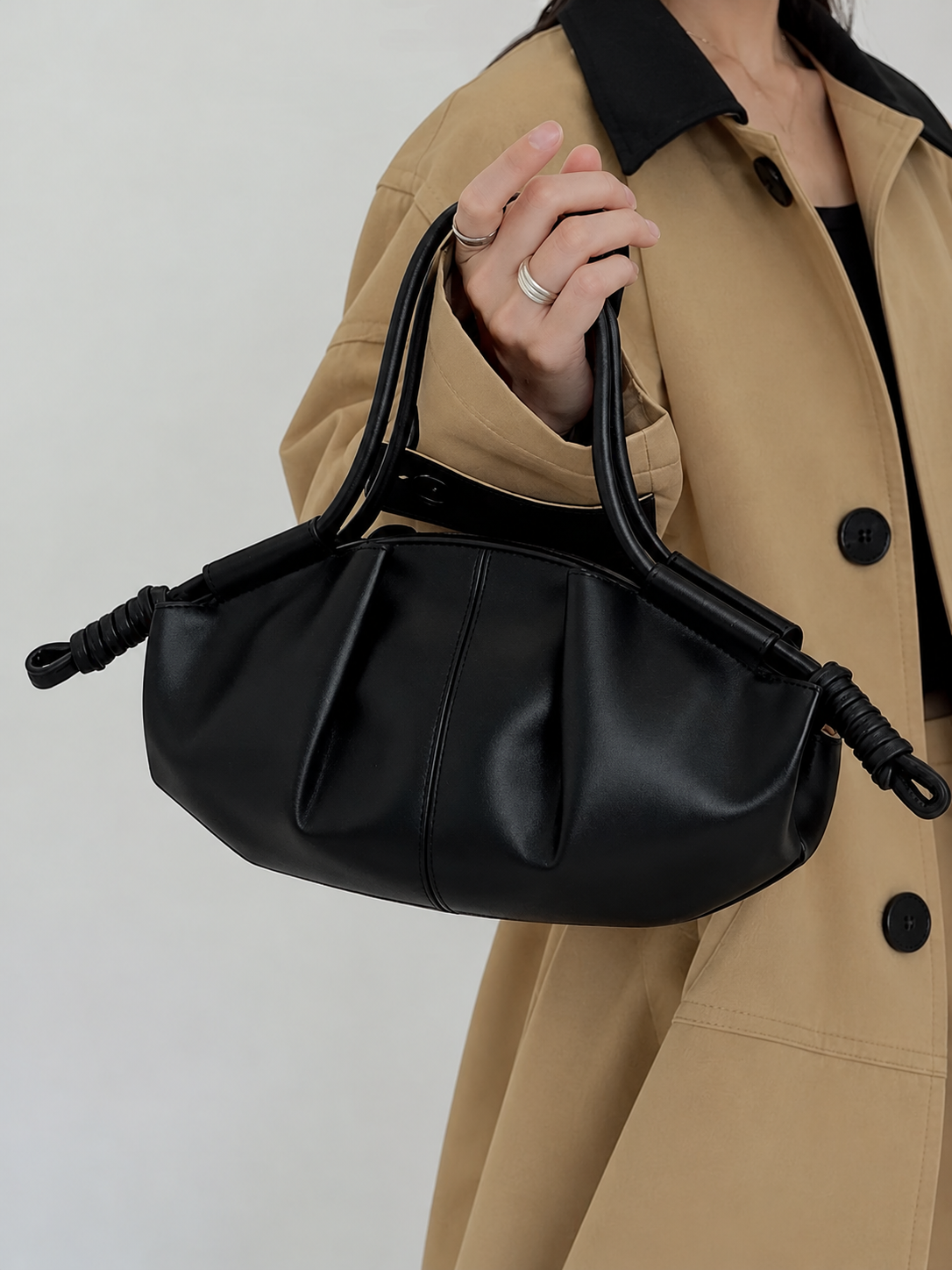black model pleated shoulder bag with wrapped side details