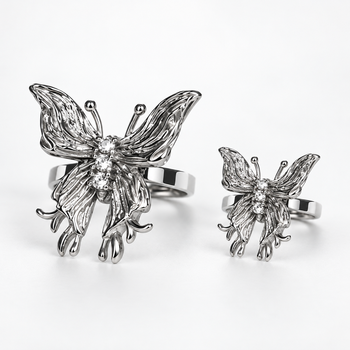 Large and small silver-tone butterfly rings, sold individually