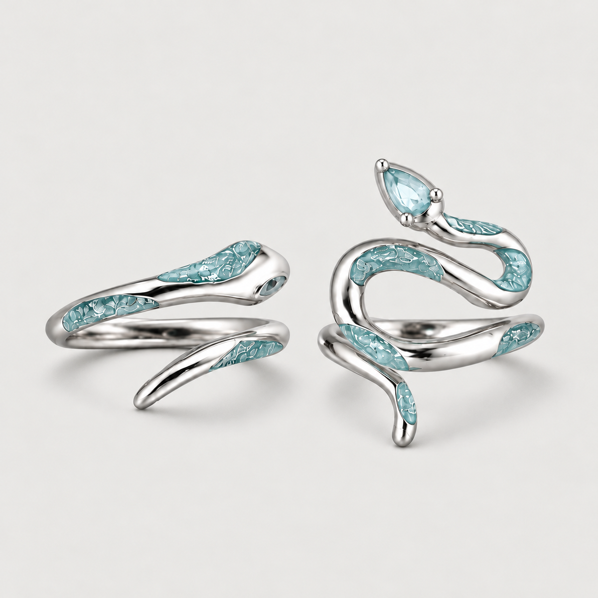 Blue Snake Ring on a warm grey background
