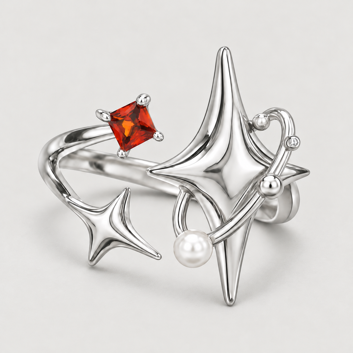 Red Celestial Star Ring on a warm grey background