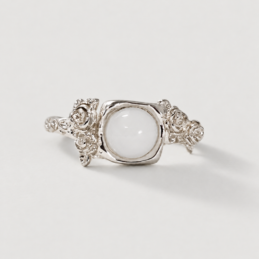 White stone rose open ring on light background