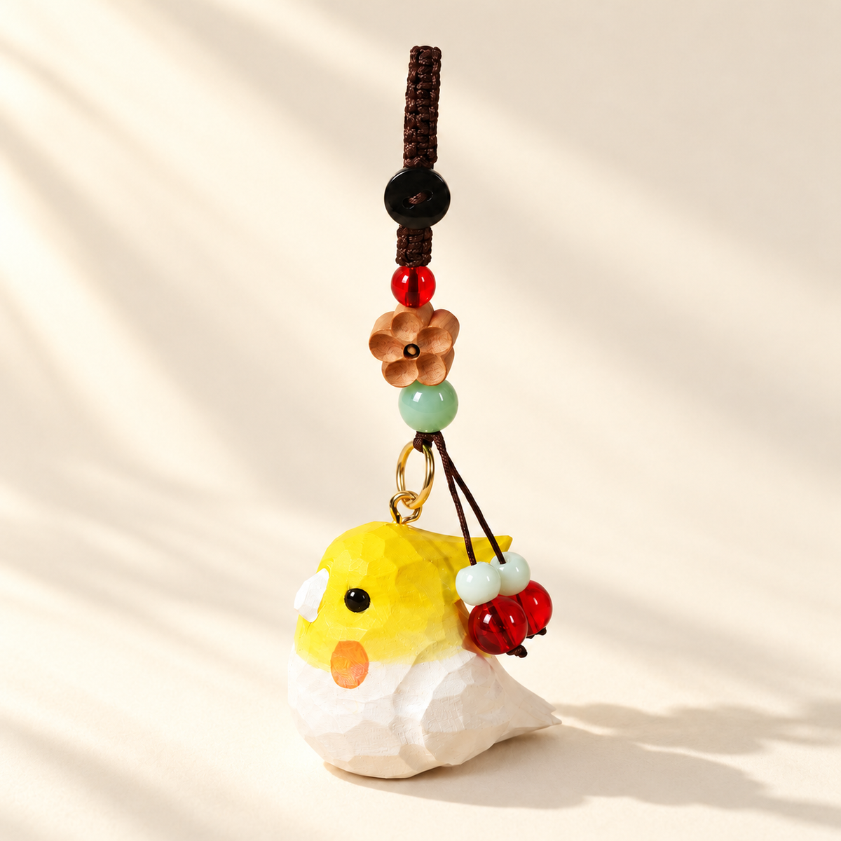 Bird wooden charm on ivory background